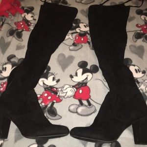 Black thigh high boots